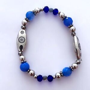 Silver and blue tribal bracelet.